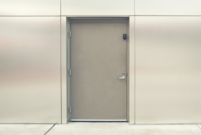 Steel door and frame in a commercial exterior wall